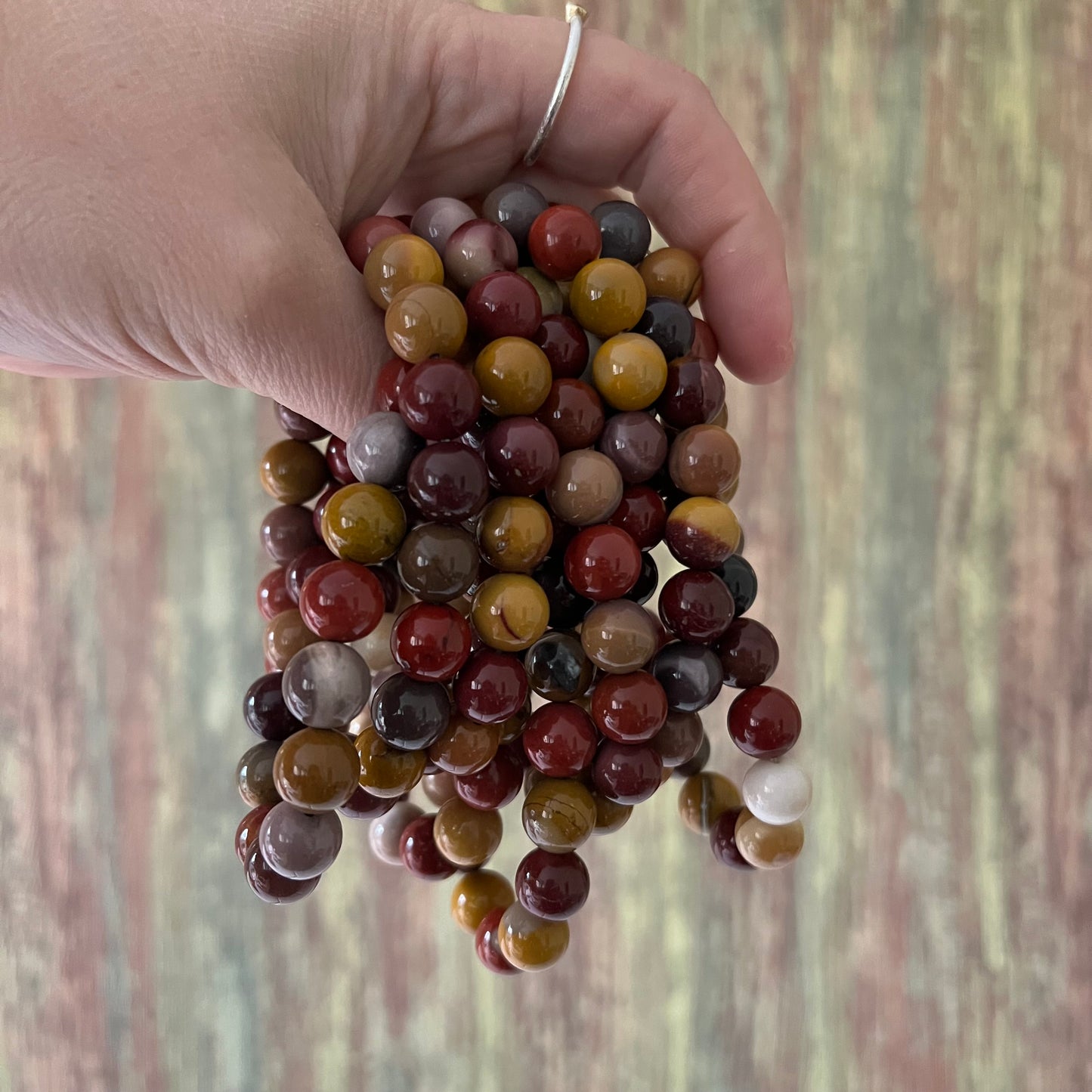 Armband Mookait Jaspis – polierte 10 mm Edelsteinperlen, ca. 18 cm